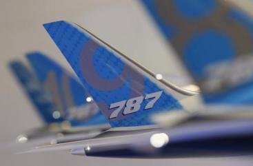 Tailwing of a model Boeing 787 Dreamliner aircraft is pictured at the Boeing booth at the Singapore Airshow